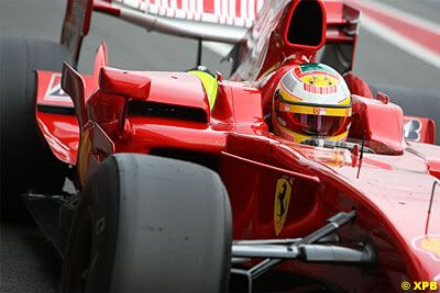 Badoer Luca Badoer in a 2008 Ferrari, with slicks and a mock-up KERS. See the cooling box on the side here.