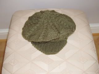 Cbaled hat with a peak