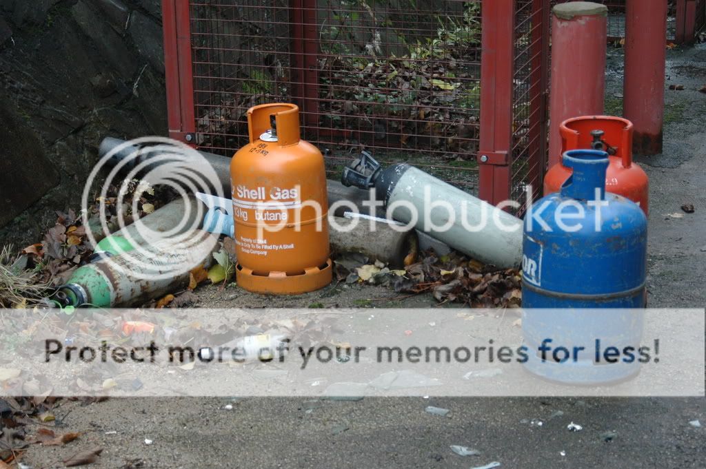 Discarded gas cylinders behind C Block